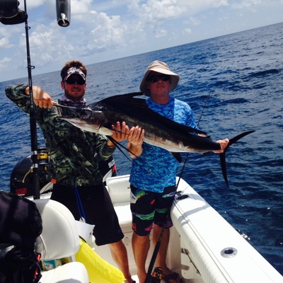 John catches his first sailfish on spinning gear. What a battle