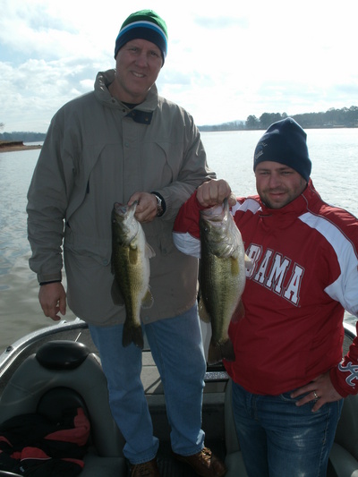 Two nice bass and two happy anglers!