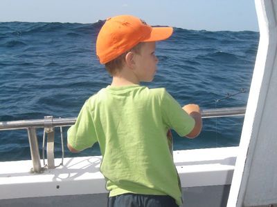 A youngster anticipating the catch