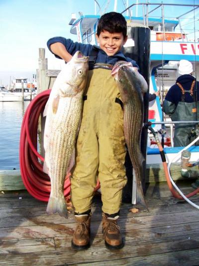 9 year old Markez with his 2 keeper Bass!