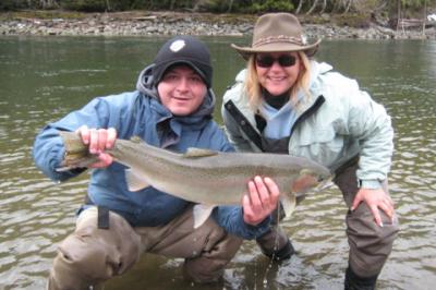 The photo of the week shows repeat guest Yvonne Williams and her guide, Greg Buck, pose with one of many Steelhead that she landed during the last 3 days while fishing at the lodge.  She caught the majority of her fish on