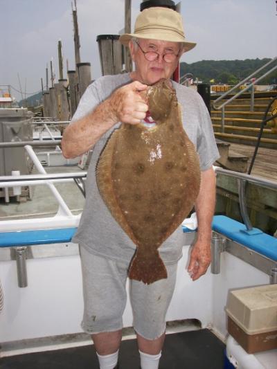 John (pop)Walsh, Bayonne N.J. With his 6 pound pool fish Fluke