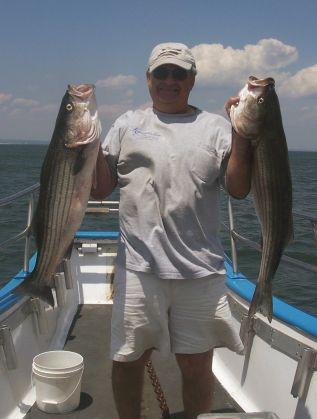 Paul Smitko, Vernon, N.J. with 2 of his 3 keeper Bass.