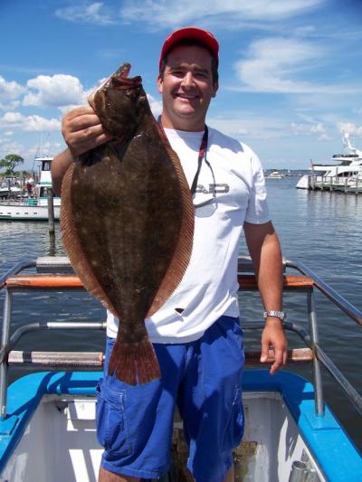 Kieran Corrigan, Tinton Falls, N.J. First Fluke! 5.4 lb. pool fish!