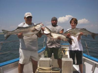 Paul Smitko, Tony and Steve Caputo with some of the limit catch.