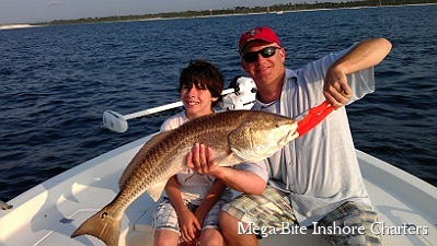 Chris and his son Nick had fun reeling in this big redfish